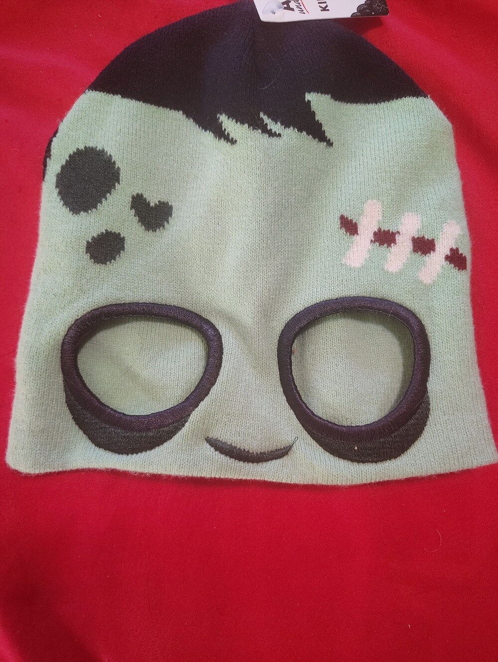 Cute Face Knit Beanie in Mint Green with Black Accents